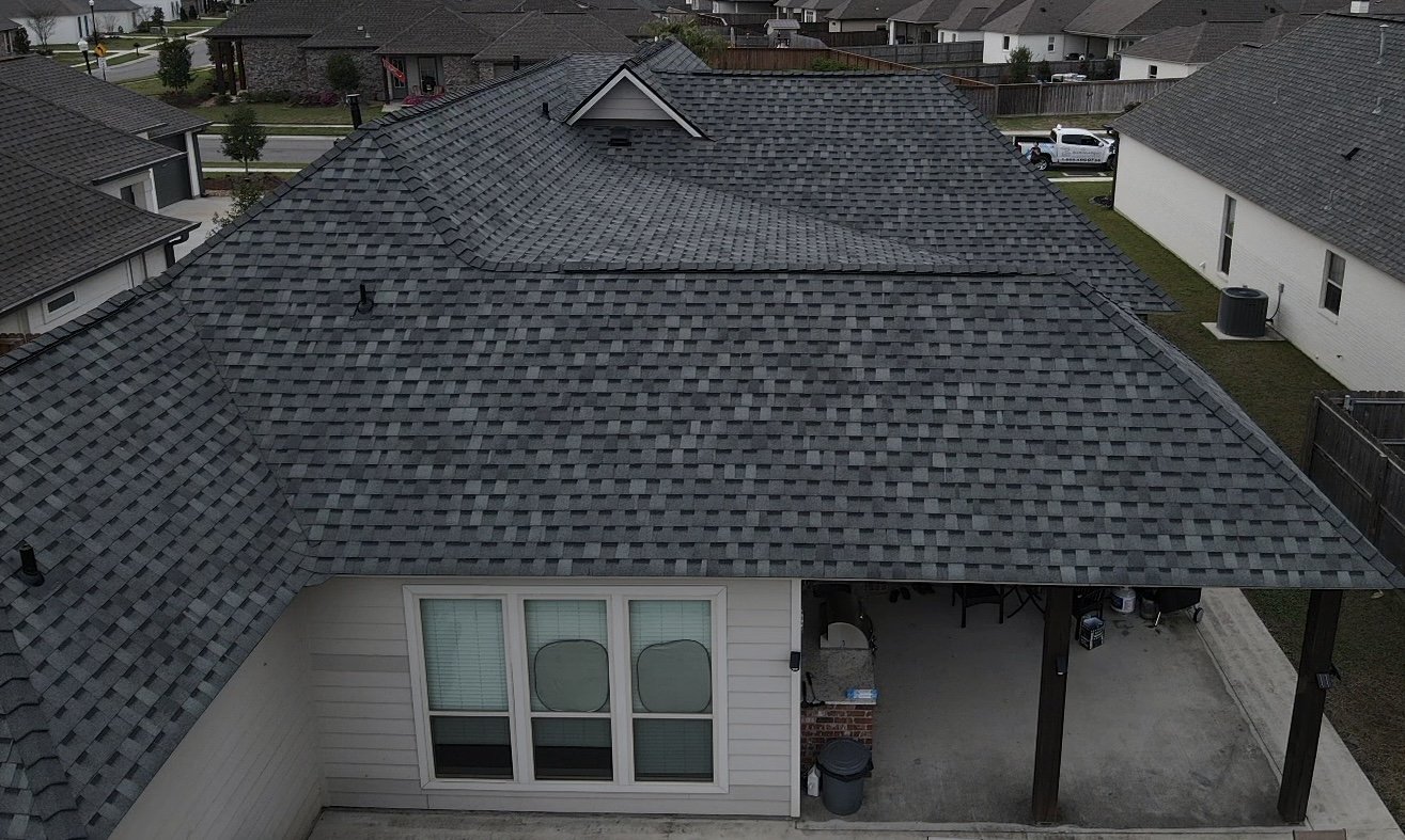 Aerial view of new dark architectural shingle roof on Lafayette area home