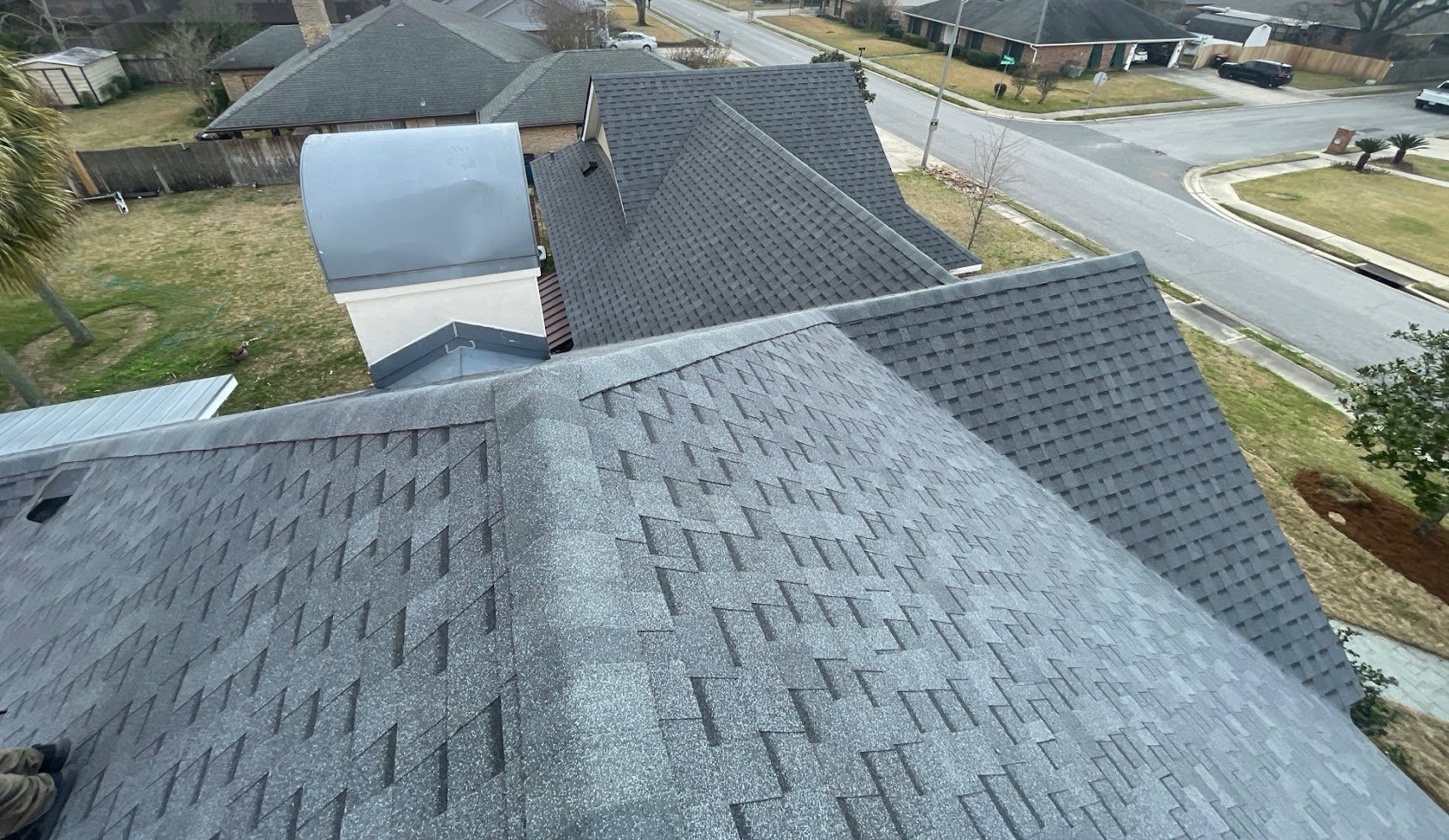 New architectural shingle roof installation on ranch-style home in Acadiana