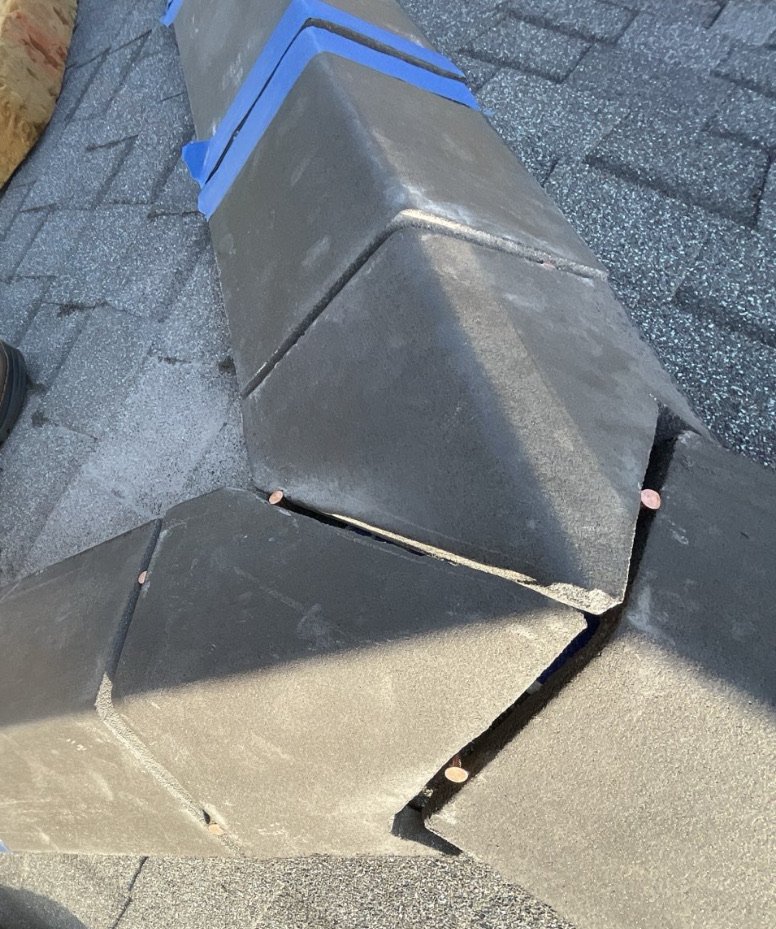 New ridge vent installation on architectural shingle roof